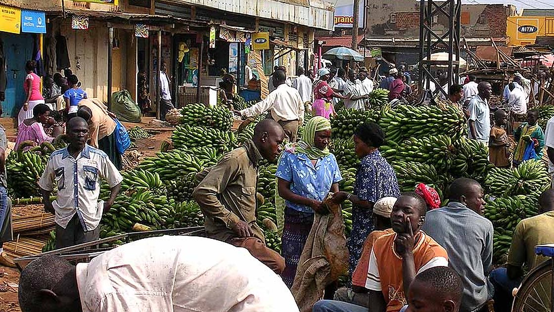 Street-side matooke stalls at Iganga Main Market, Uganda