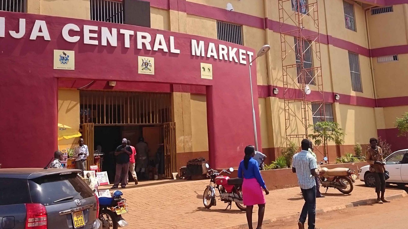 Jinja Central Market building, Uganda, with Jinja Central Market lettering on the red facade